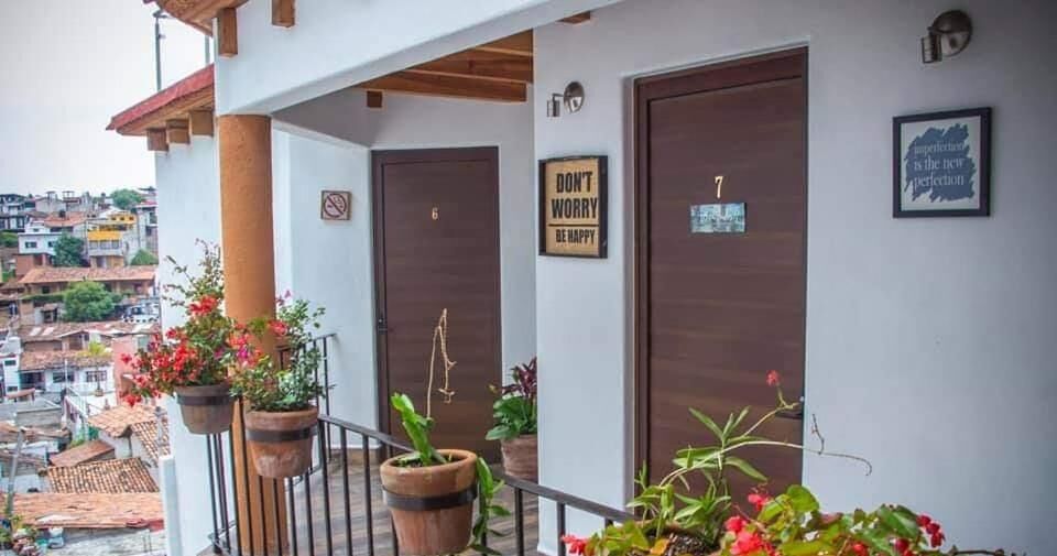 Flower-filled balcony corridor